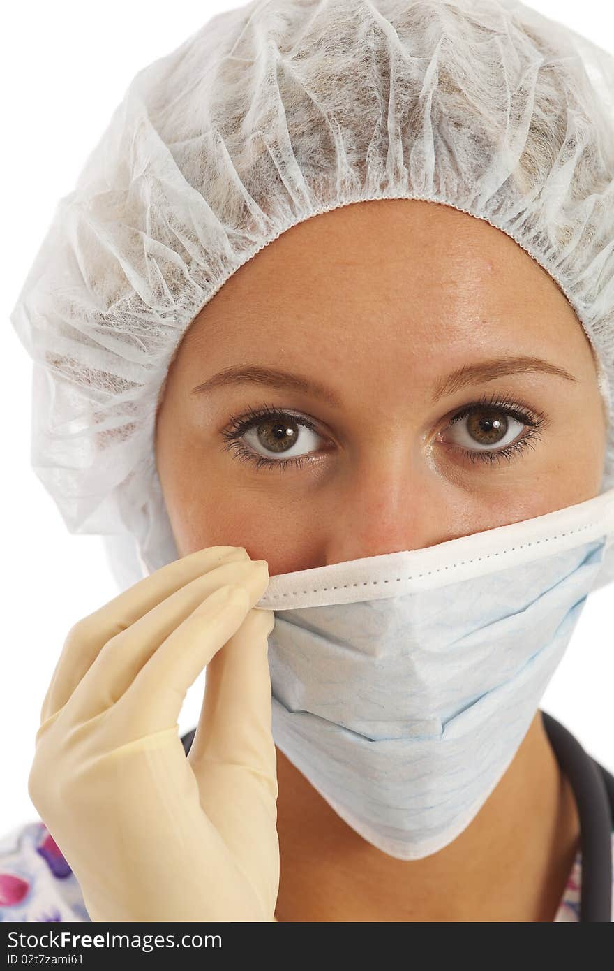 Close-up portrait of young woman nurse in scrubs