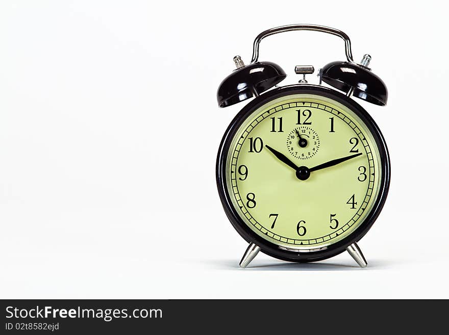 Alarm clock with look space on left side of image. Alarm clock with look space on left side of image