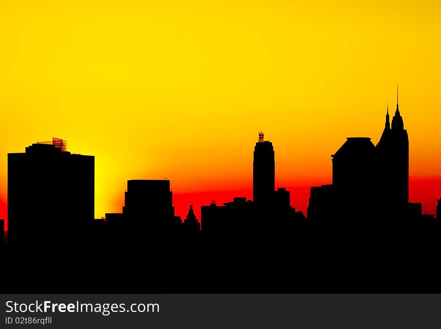 Silhouette of downtown New York City, Manhattan, financial district, at sunset. Silhouette of downtown New York City, Manhattan, financial district, at sunset.