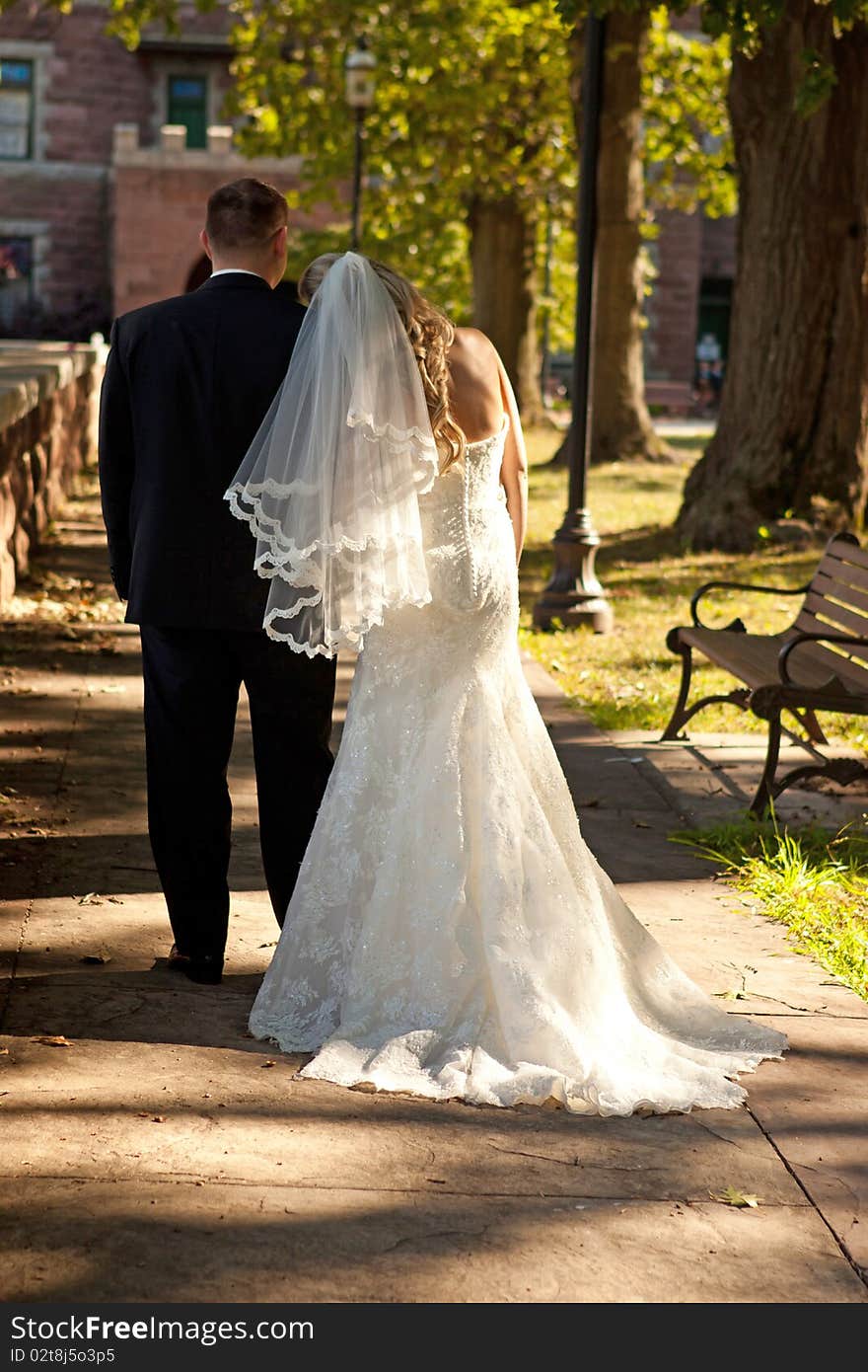 Bride and groom walking together