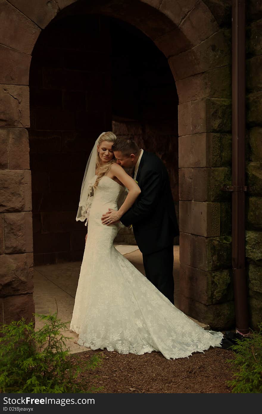 Bride and groom on a wedding photo session. Bride and groom on a wedding photo session