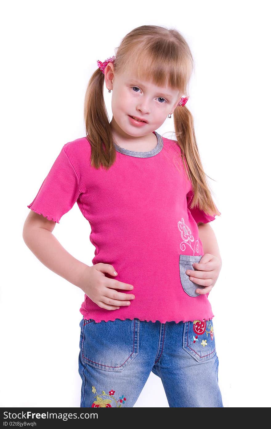 Little girl posing on front of camera. little girl in jeans on white background .four year baby, isolated white.