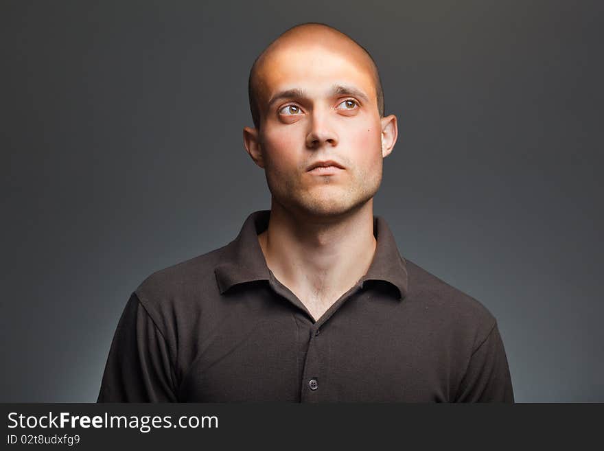 Pensive young man in shirt