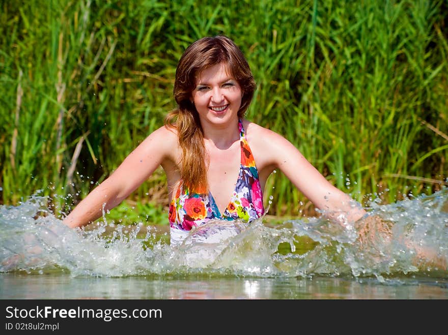 Beautiful girl in water