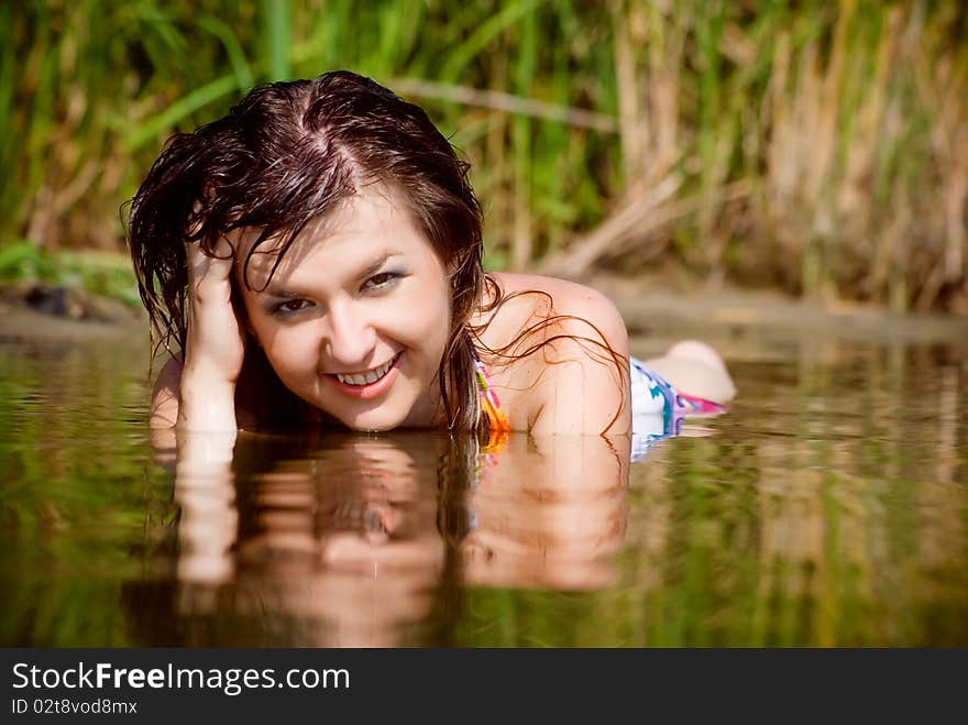 Beautiful girl in water