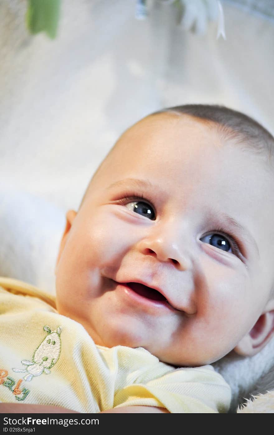 portrait of a cute baby with big smile. portrait of a cute baby with big smile