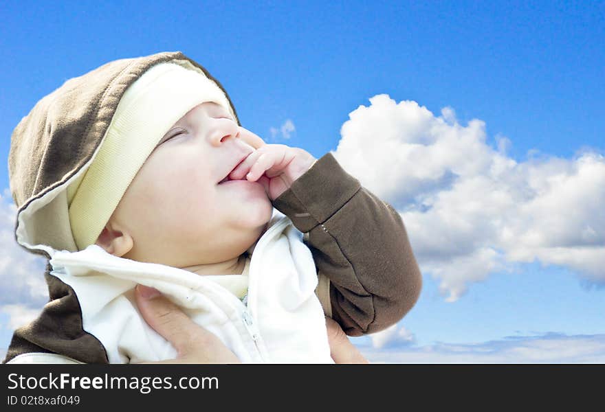 baby in looking up into the sky. baby in looking up into the sky