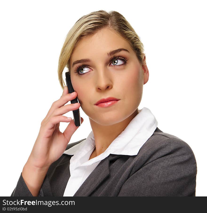 Pretty young woman thinking and holding phone. Pretty young woman thinking and holding phone