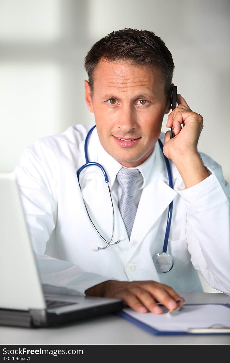 Closeup of doctor working in the office. Closeup of doctor working in the office