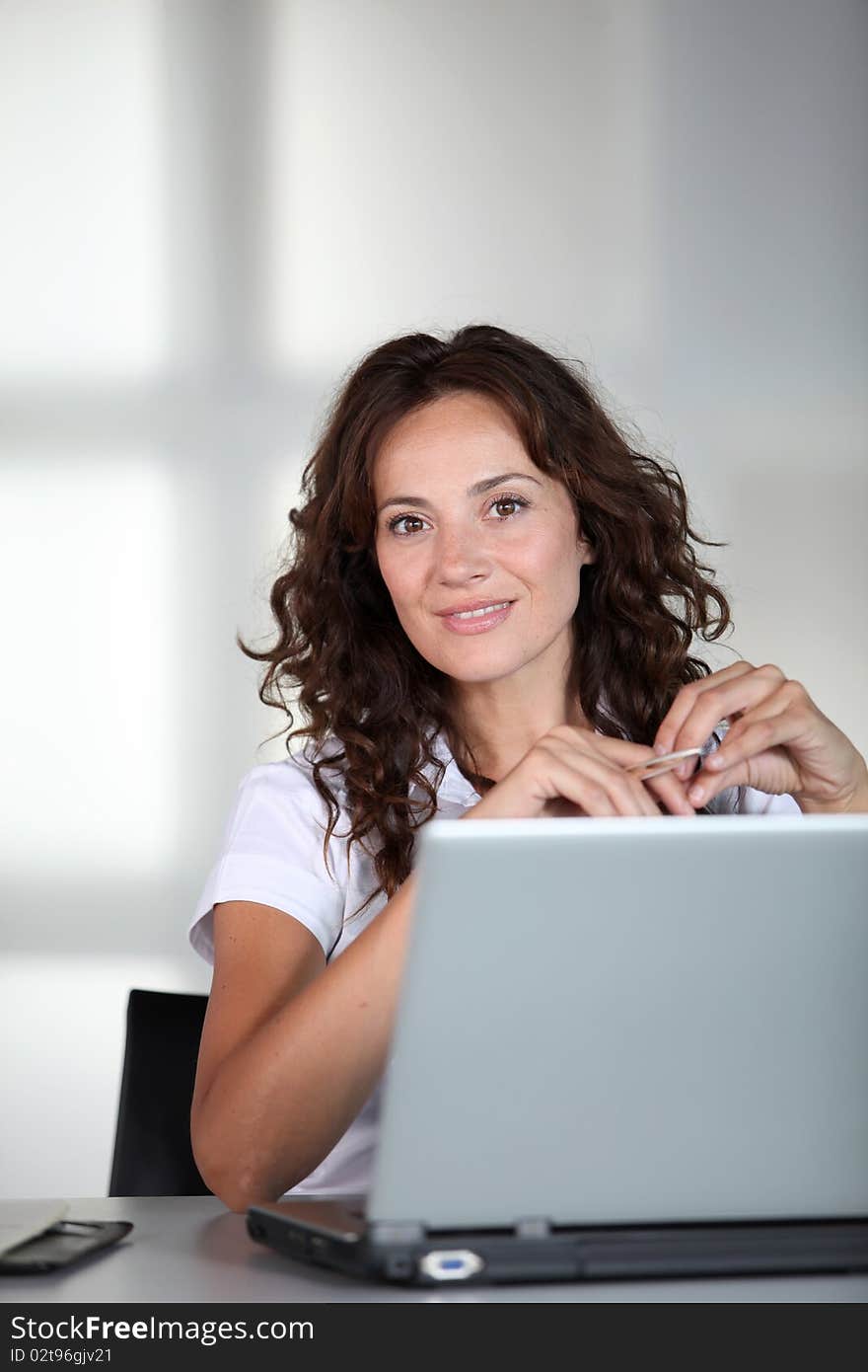 Businesswoman working in the office. Businesswoman working in the office