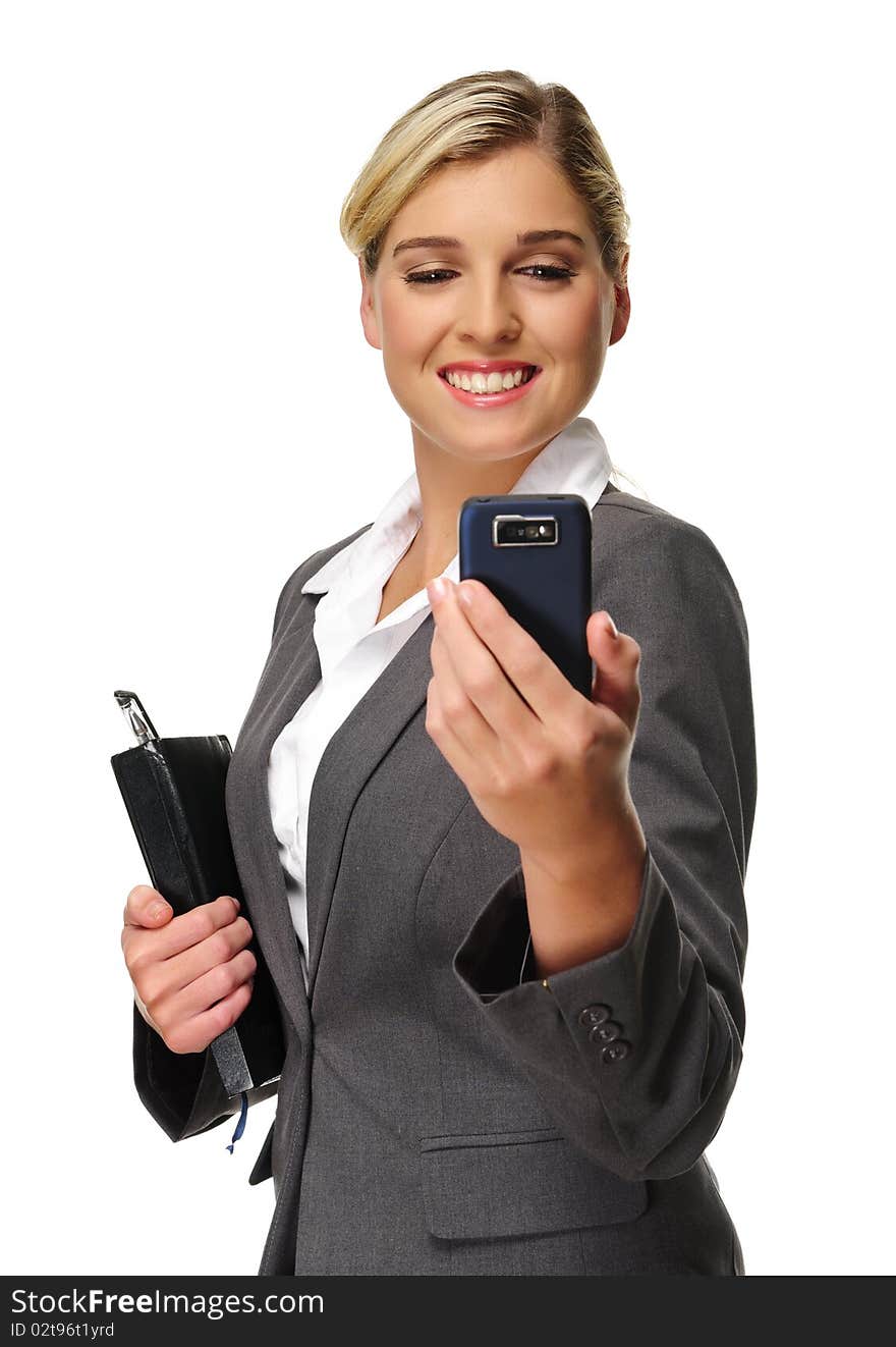 Pretty young woman is happy with her phone. Pretty young woman is happy with her phone