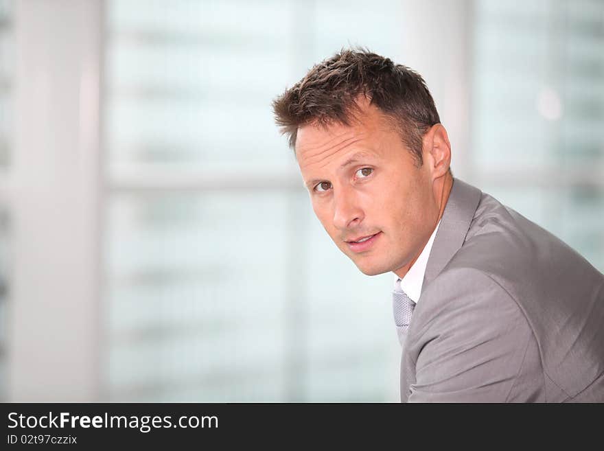 Portrait of businessman in grey suit. Portrait of businessman in grey suit