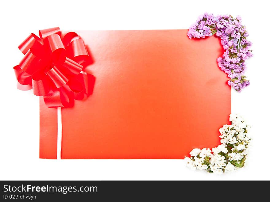 Red card with bow on white with flowers design