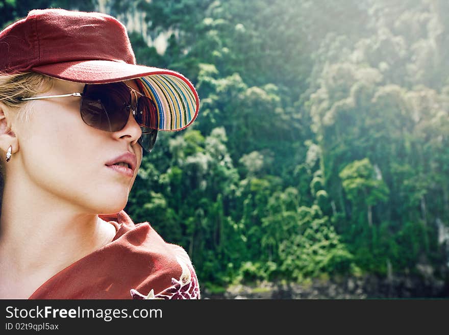 High key portrait of young beautiful woman in summer environment. High key portrait of young beautiful woman in summer environment