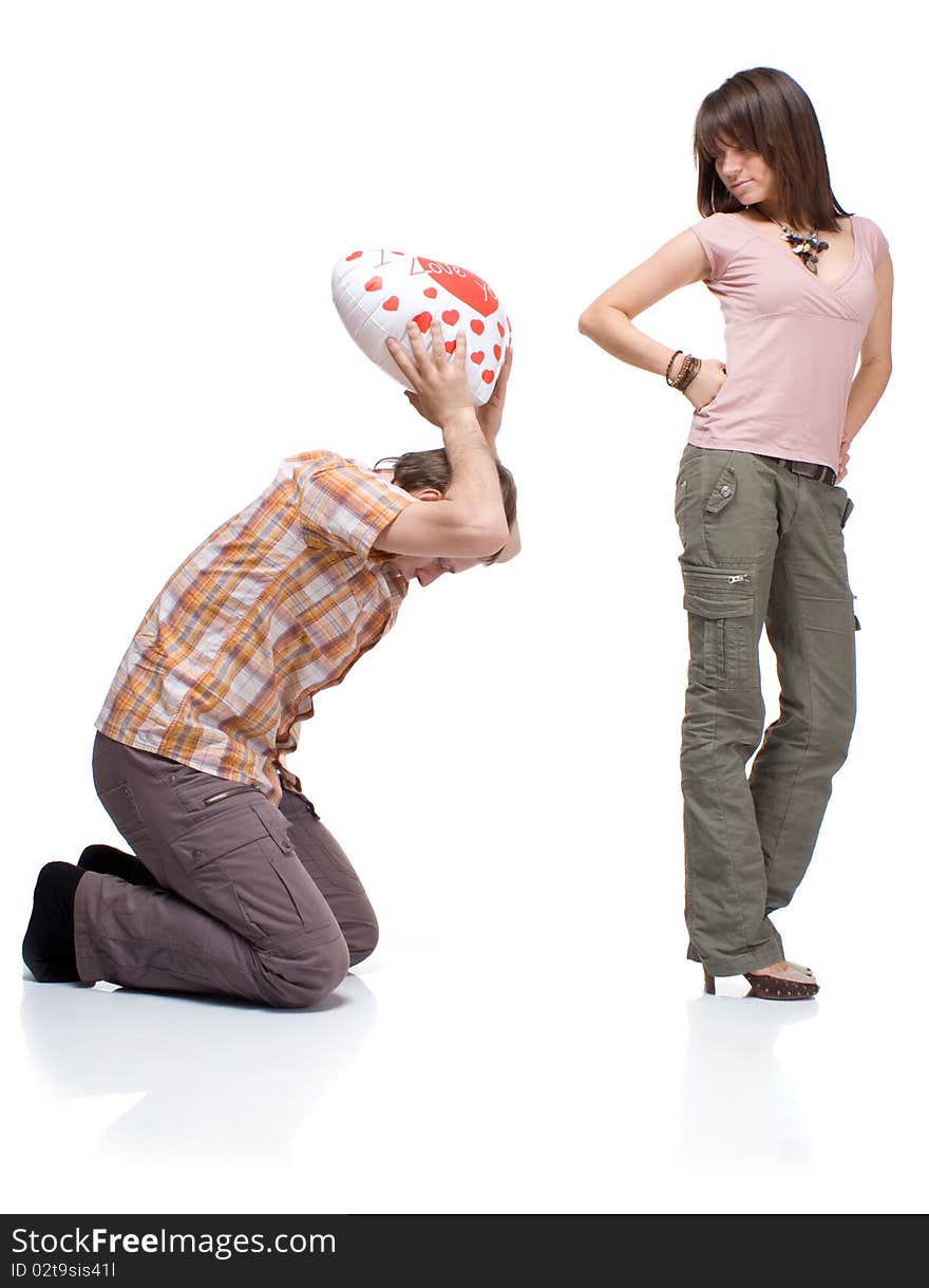 The boy gives a girl's heart on white background