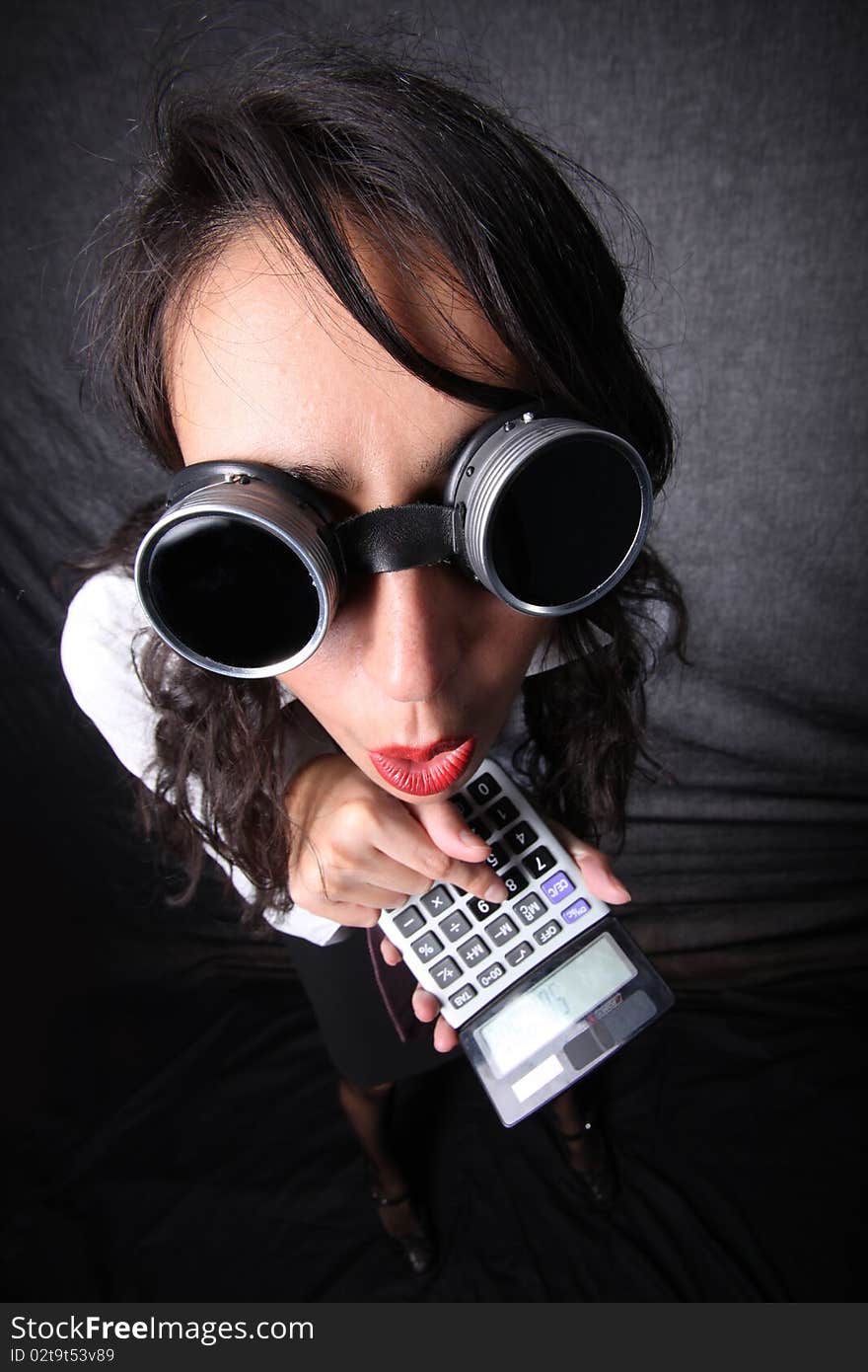 Manager with calculator and glasses