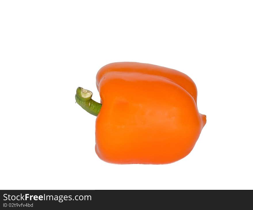 Excellent orange pepper with a green pod on a white background