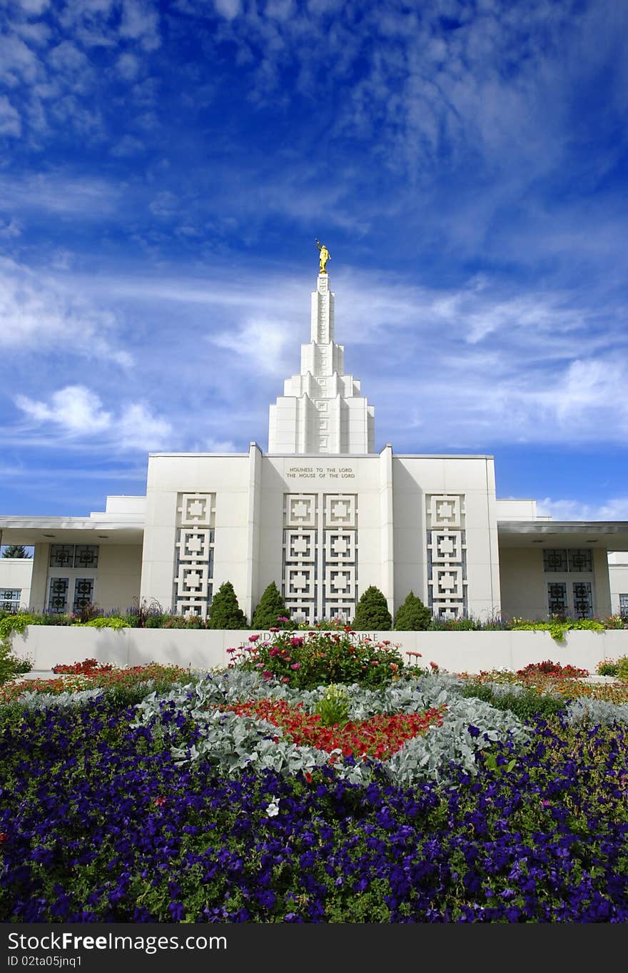 Mormon Temple with blue sky and clouds in background