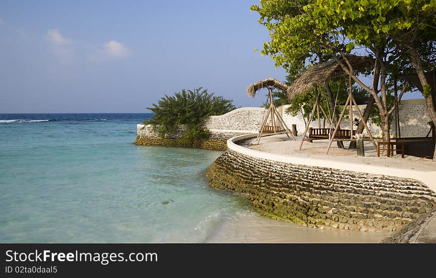 Maldives coast with teeterboard and different plants