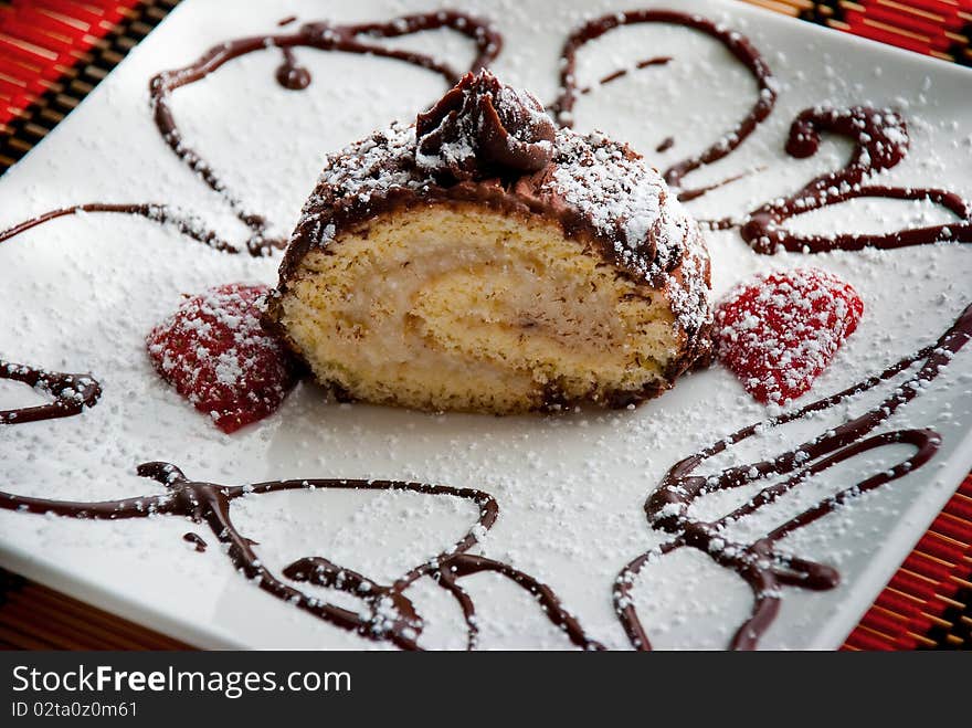 Home made chocolate and cream roll cake. Home made chocolate and cream roll cake