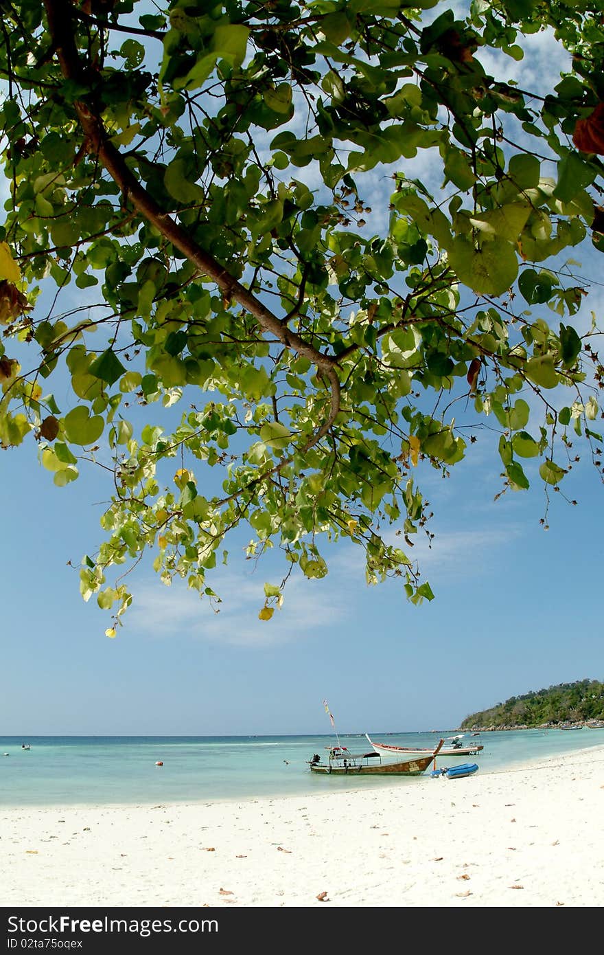 Longtail boat waiting at Koh Lepe , Andaman sea in Tarutao Marine National park , Thailand. Longtail boat waiting at Koh Lepe , Andaman sea in Tarutao Marine National park , Thailand