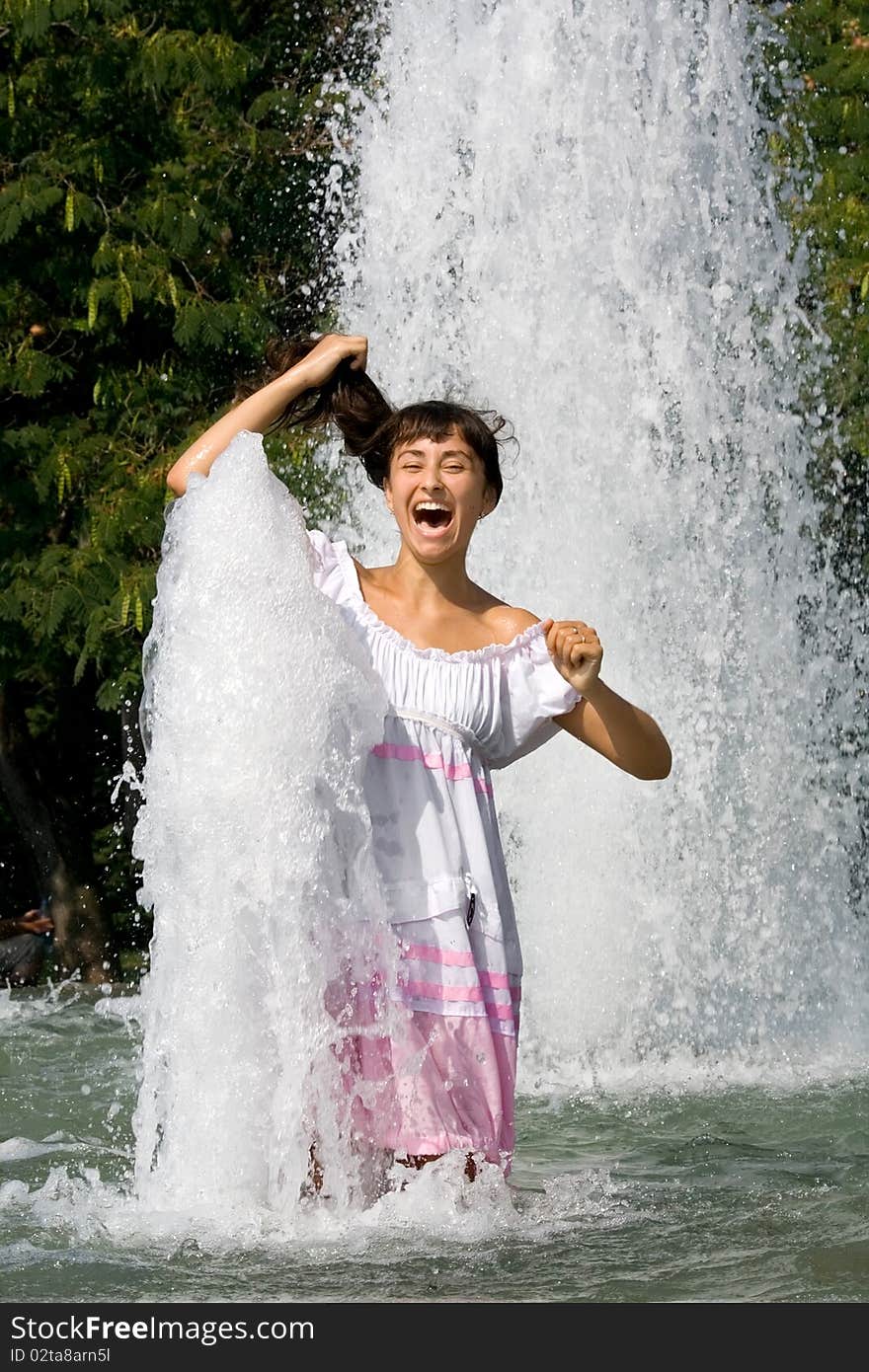 Girl washing in the fontain