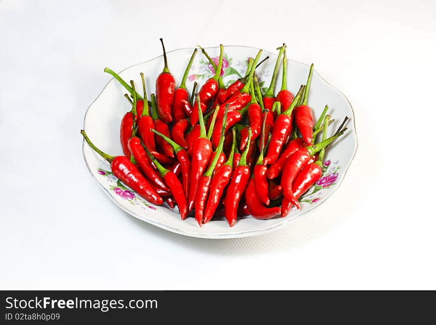 Red chili peppers in white background