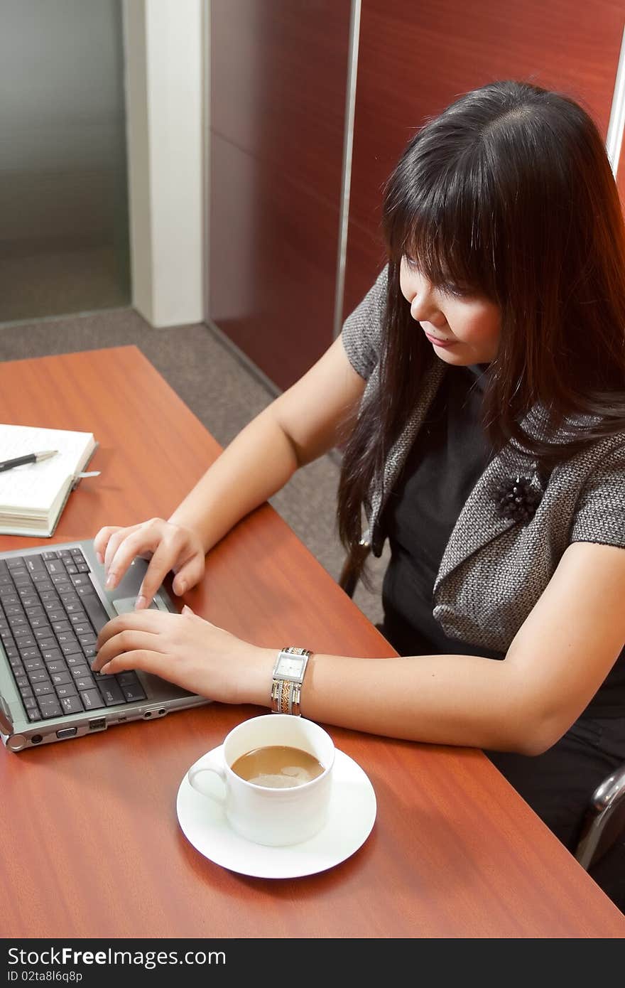 Ethnic business woman working in the office