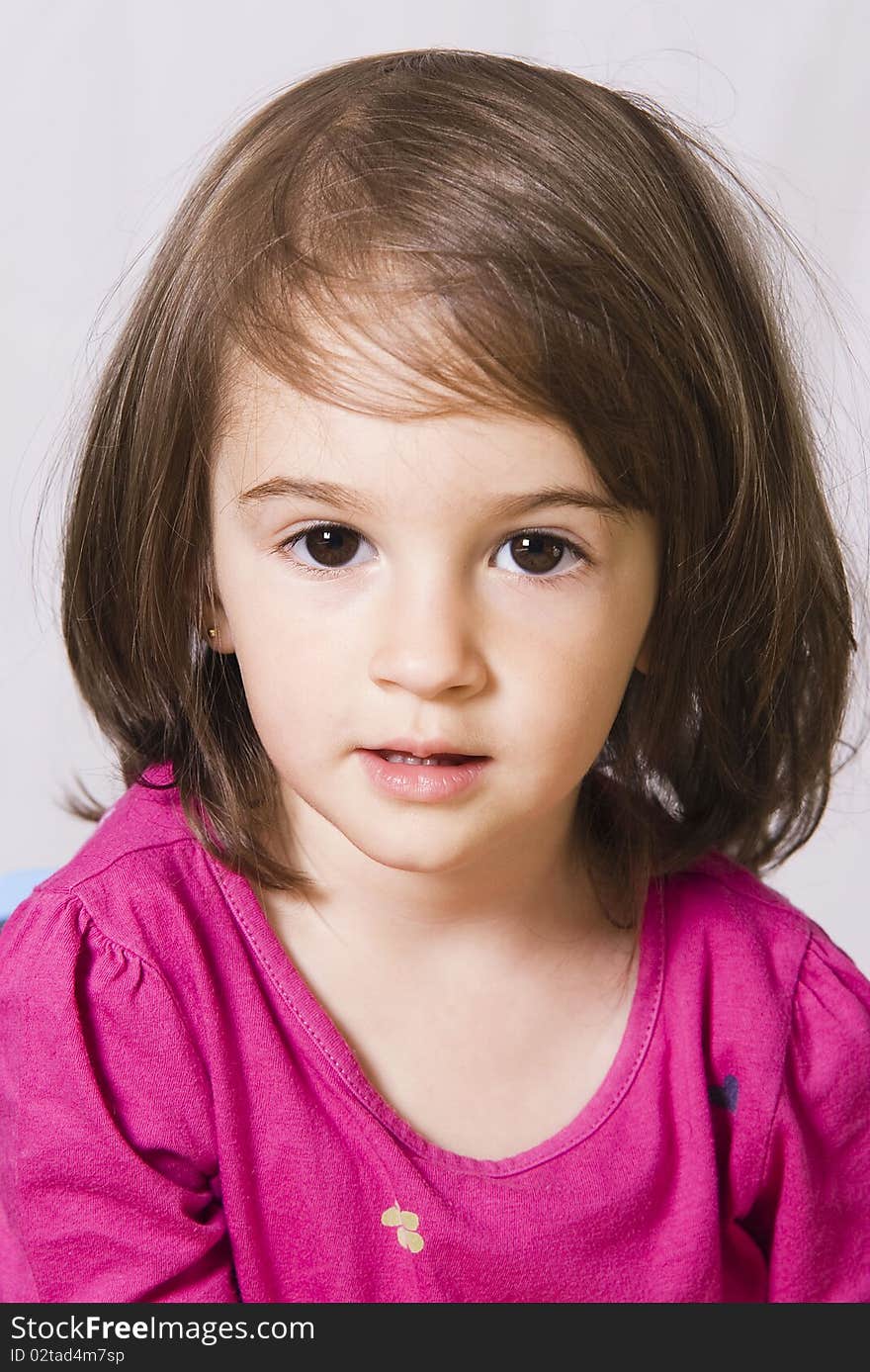 Portrait of a little girl in studio posing. Portrait of a little girl in studio posing