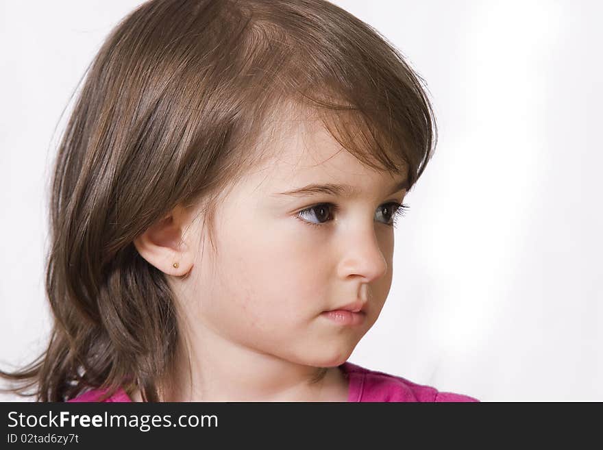 Portrait of a little girl in studio posing. Portrait of a little girl in studio posing