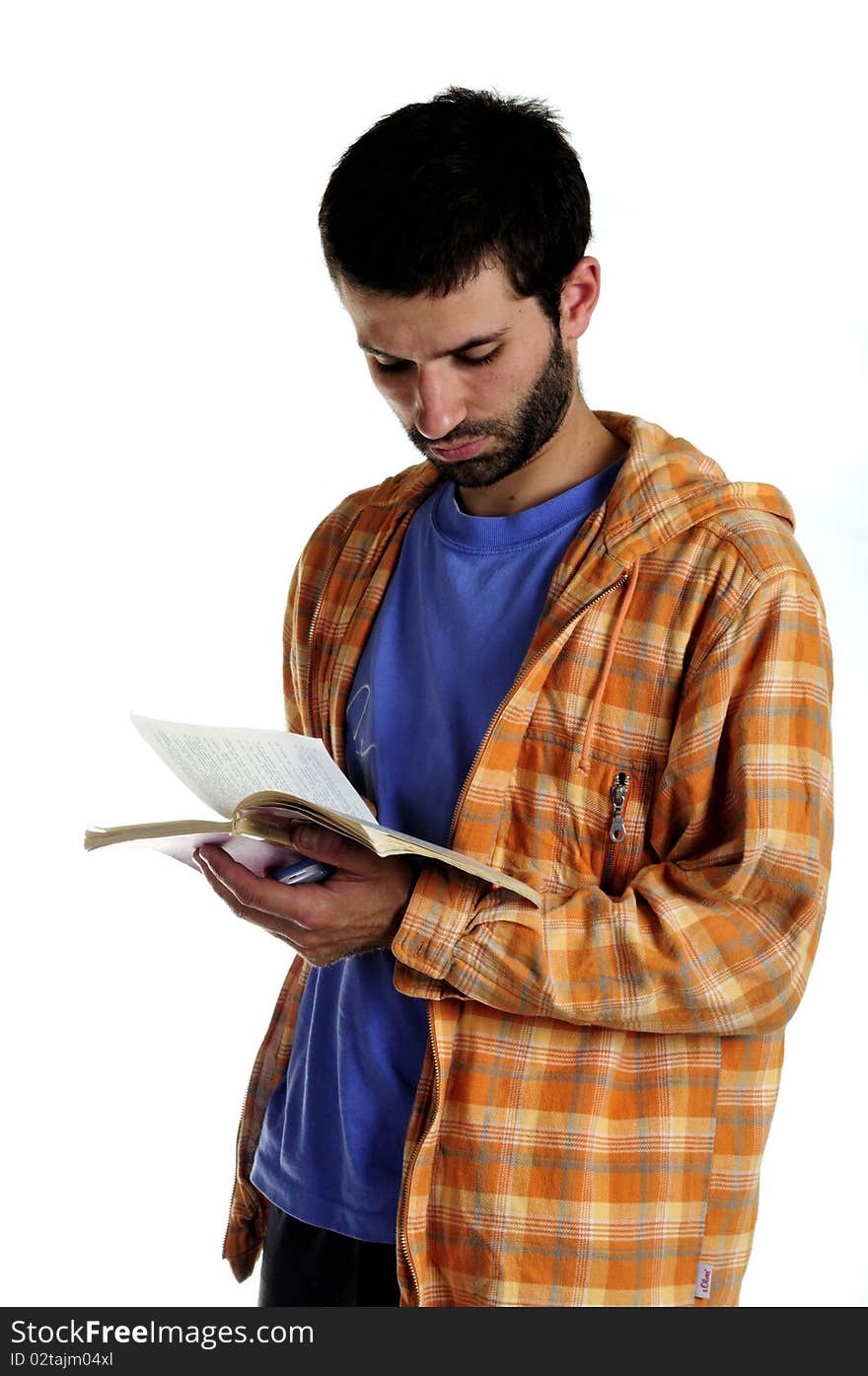 Young man reading book isolated on white background