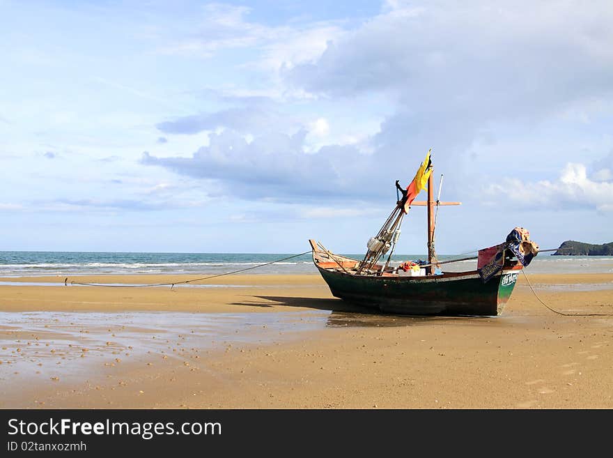 A long tail boat on the beach, Thailand