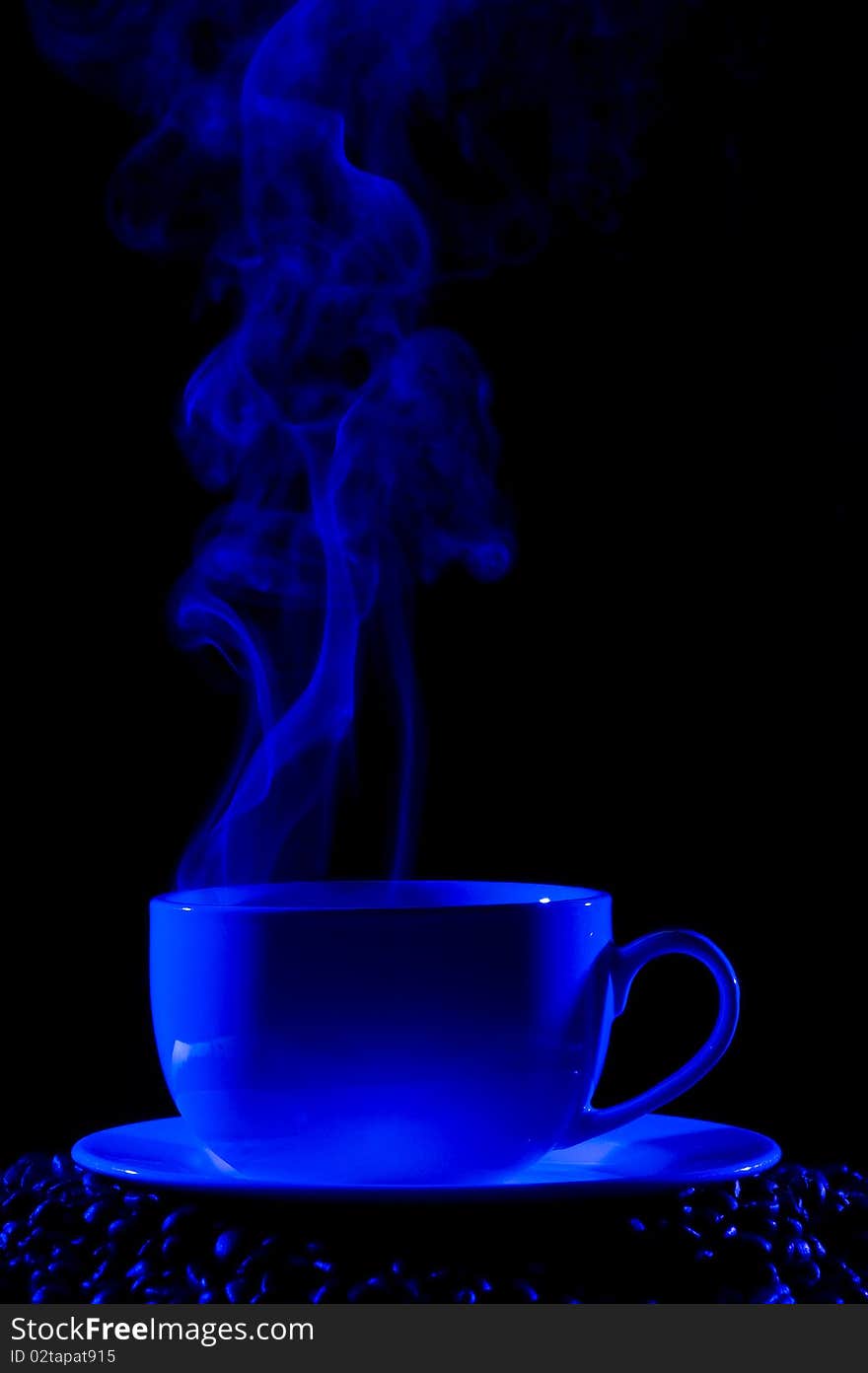 Coffee cup with steam on black background