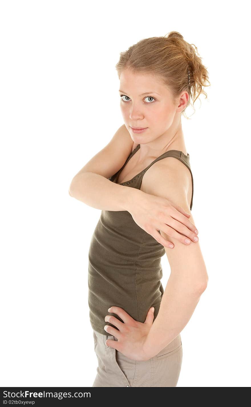 Portrait of a young girl in khaki sportswear. Portrait of a young girl in khaki sportswear