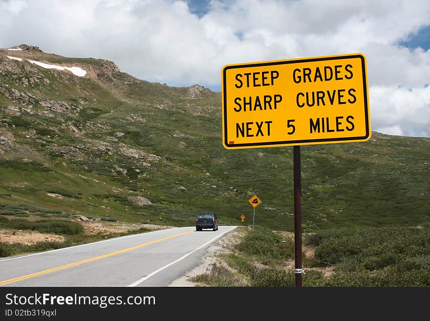 Steep grades and curves - road sign