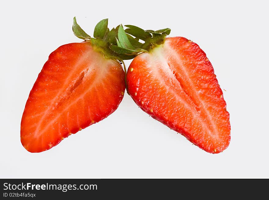 Strawberry halves on a white background