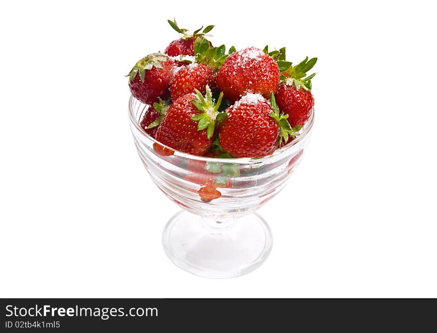 Strawberry in a glass isolated over white