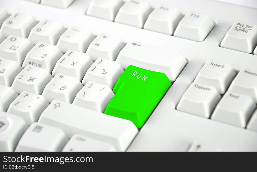 Color button on the background of a white keyboard