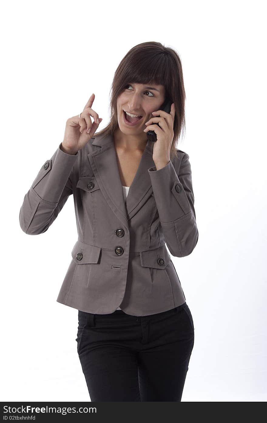 This photo shows a business woman talking on the phone.