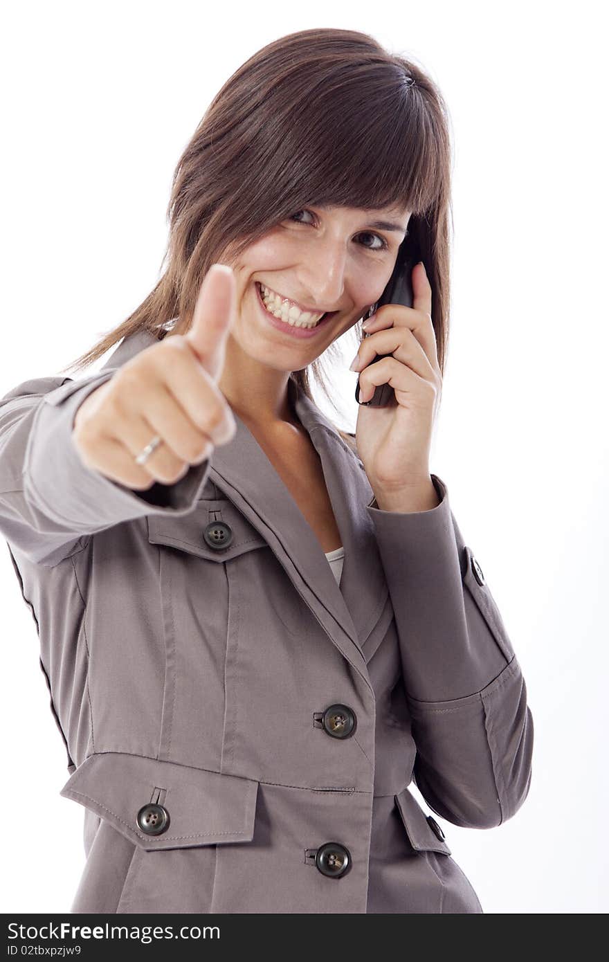 This photo shows a business woman talking on the phone.