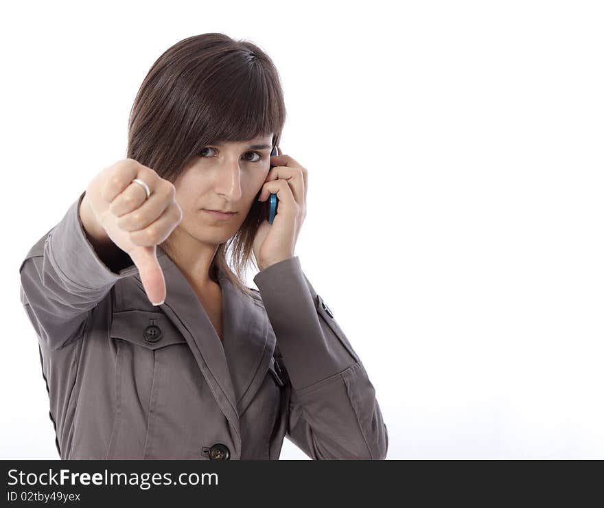 This photo shows a business woman talking on the phone.