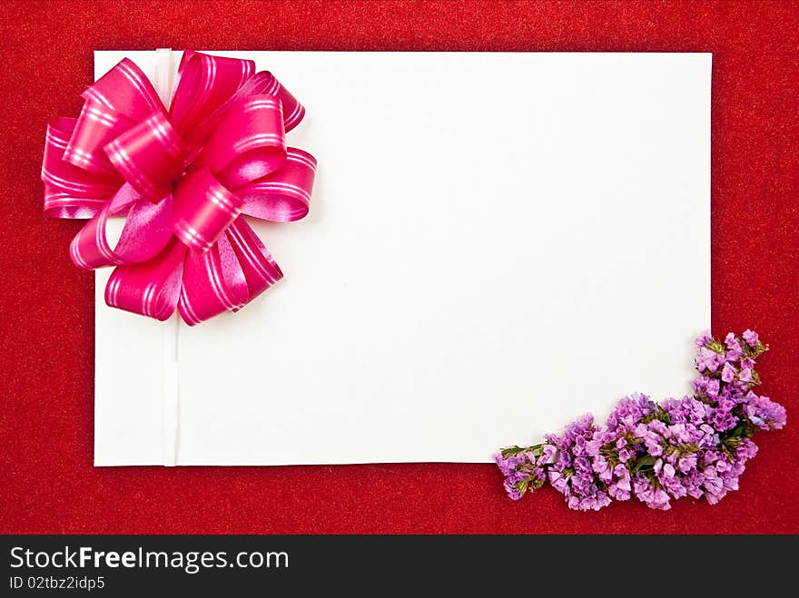 White paper blank on red with flowers design on red background. White paper blank on red with flowers design on red background