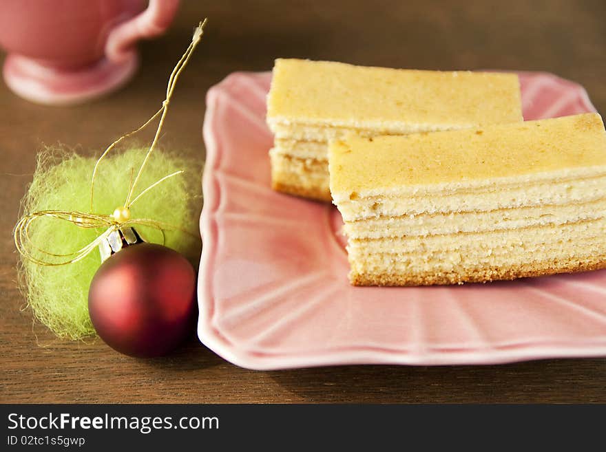 Cake and christmas decoration on a table