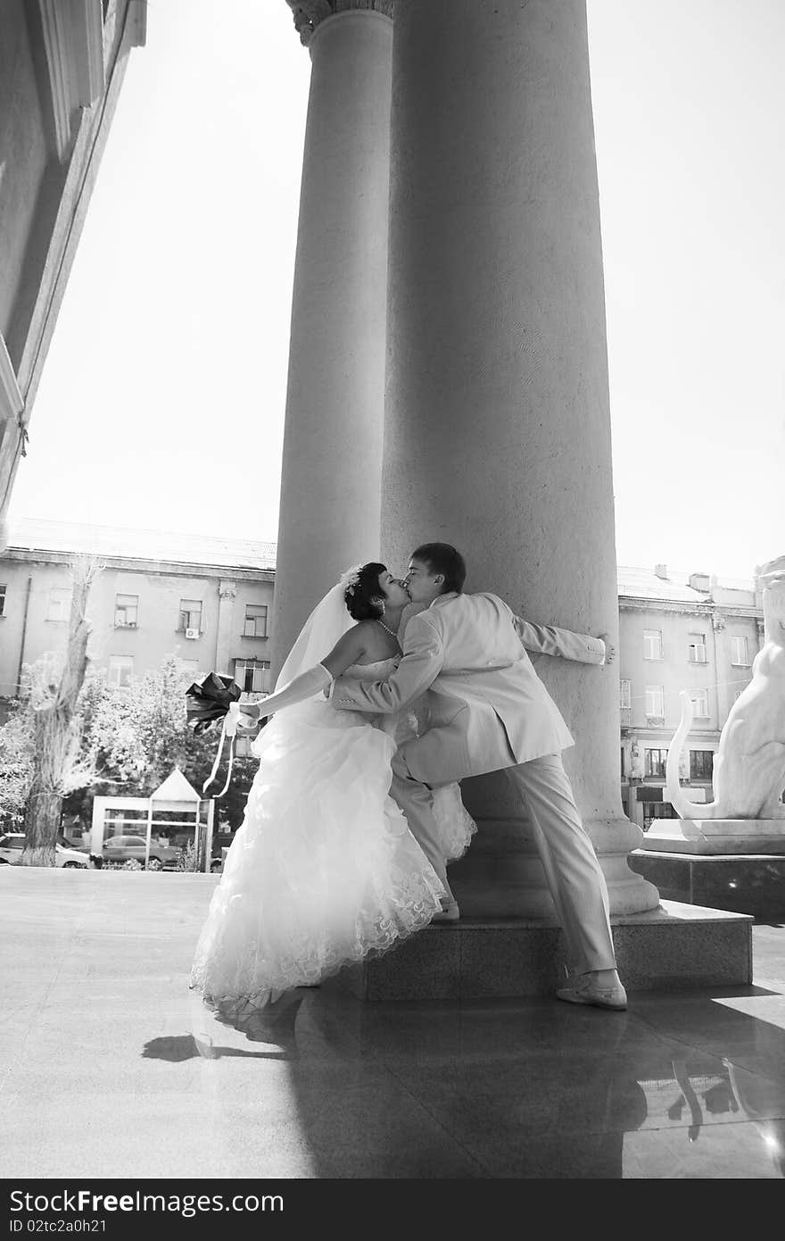 Groom and the bride kiss