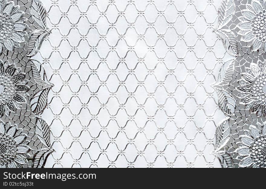 White texture of cloth with flowers