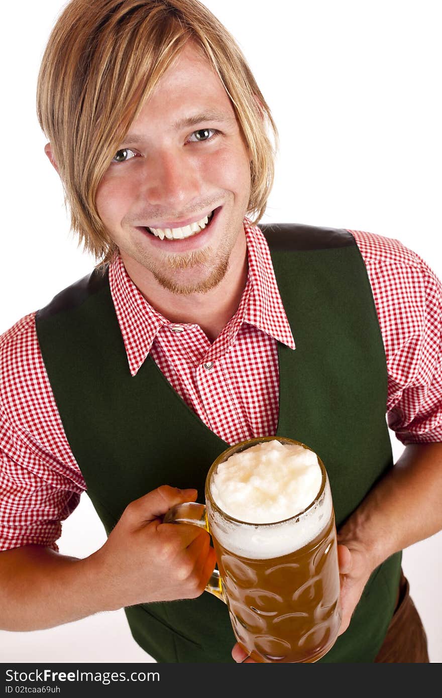 Man  holds oktoberfest beer stein and looks happy into camera. Isolated on white background. Man  holds oktoberfest beer stein and looks happy into camera. Isolated on white background.