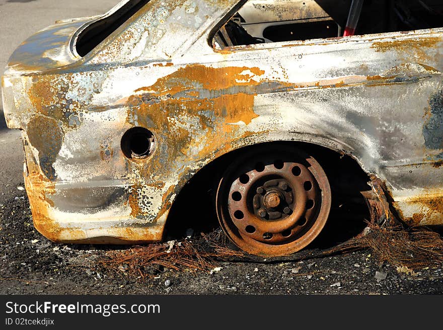 Rear end of a burnt out car. Rear end of a burnt out car