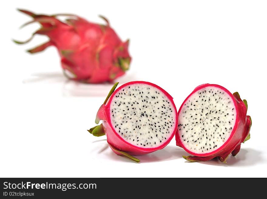 The fresh dragon fruit on the white background