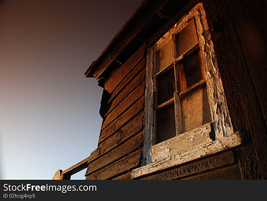 An image of an old rotting window in need of some tlc. An image of an old rotting window in need of some tlc