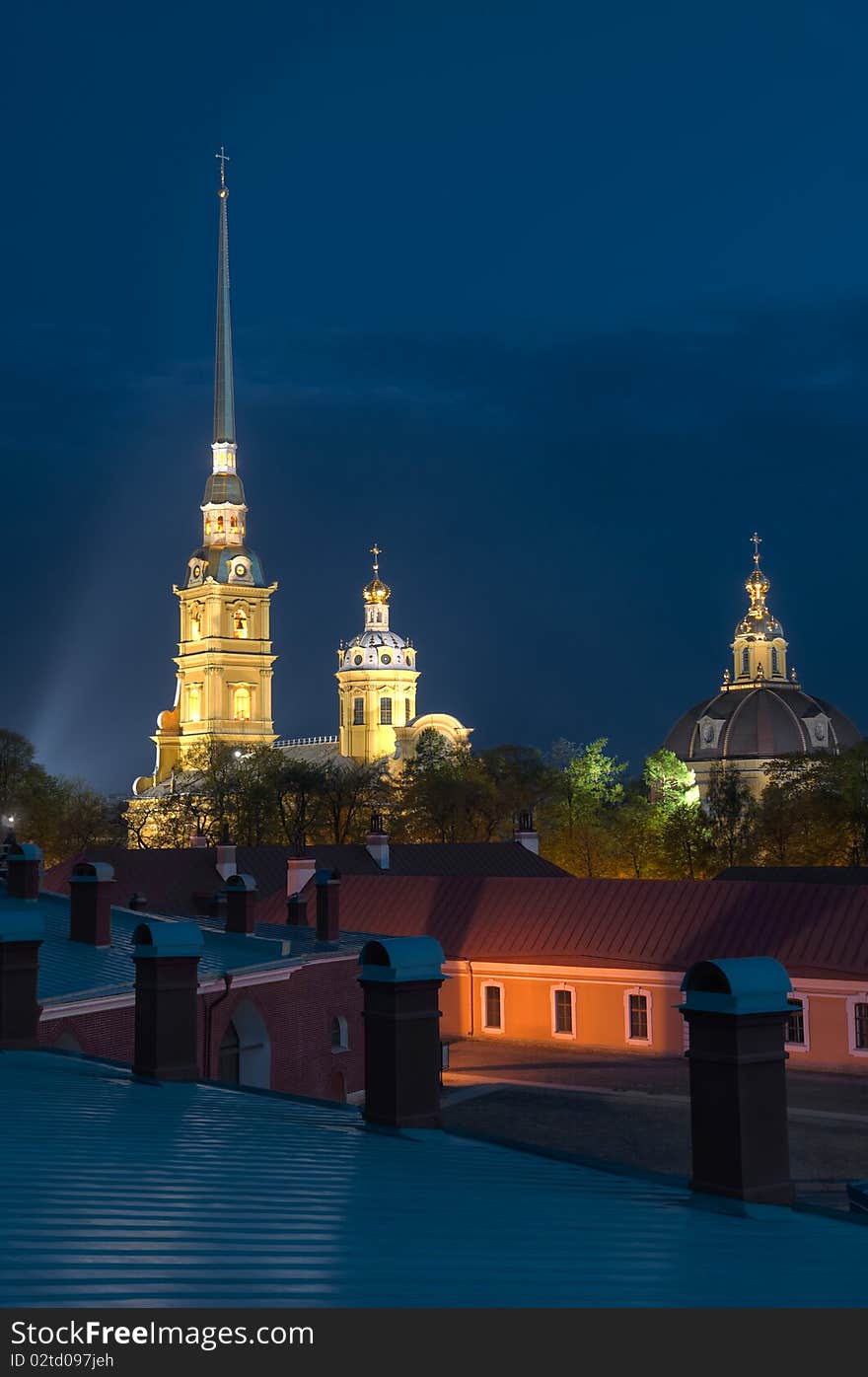 From late May to early July nights are bright in St Petersburg - so-called White Nights. Photo was taken at 4 am. The Peter and Paul Cathedral is a Russian Orthodox cathedral located inside the Peter and Paul Fortress in St. Petersburg, Russia. It is the first and oldest landmark in St. Petersburg, built between 1712 and 1733 on Zayachy Island along the Neva R. From late May to early July nights are bright in St Petersburg - so-called White Nights. Photo was taken at 4 am. The Peter and Paul Cathedral is a Russian Orthodox cathedral located inside the Peter and Paul Fortress in St. Petersburg, Russia. It is the first and oldest landmark in St. Petersburg, built between 1712 and 1733 on Zayachy Island along the Neva R